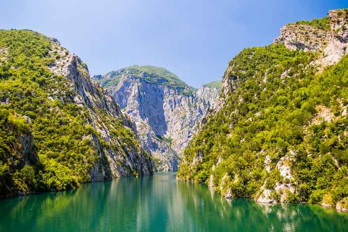 Deep green canyons and towering limestone cliffs of Albania’s Accursed Mountains