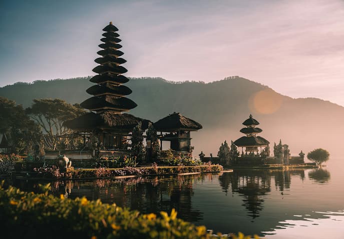 Peaceful Bali temple and lake evening scenery symbolizing healing journey after heartbreak