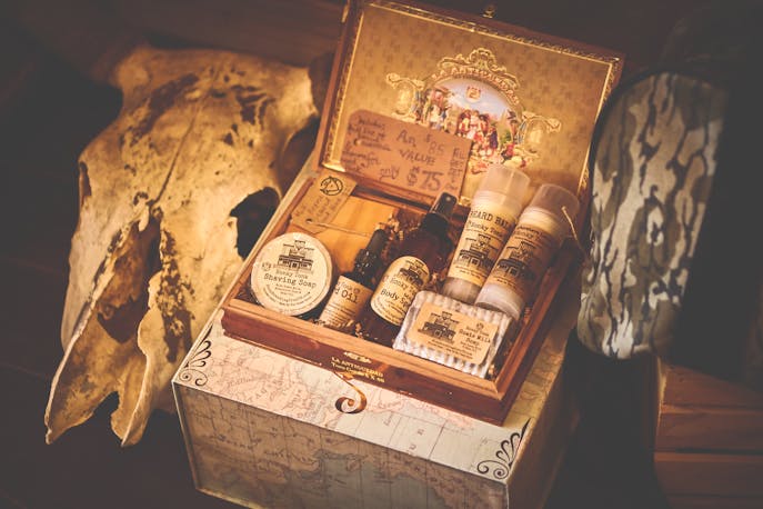 Vintage-style travel skincare kit in a wooden box