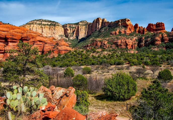 Red rock cliffs and desert landscape in Sedona, USA, representing women-only energy healing retreats
