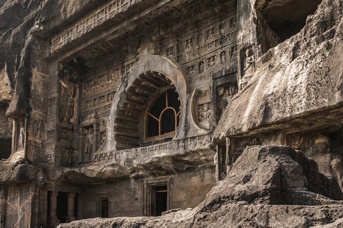 Ornate facade of Ajanta Buddhist rock-cut cave monastery in India