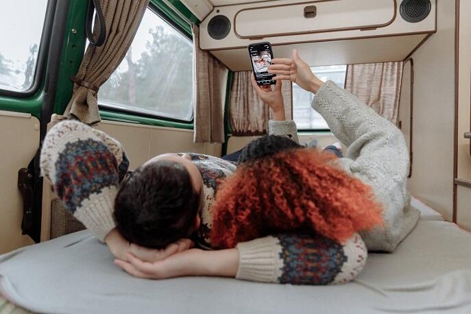 Couple enjoying peaceful times in a caravan