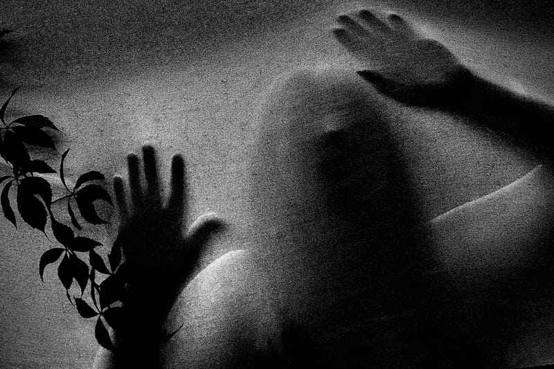 Creepy ghostly shadow haunting a castle wall