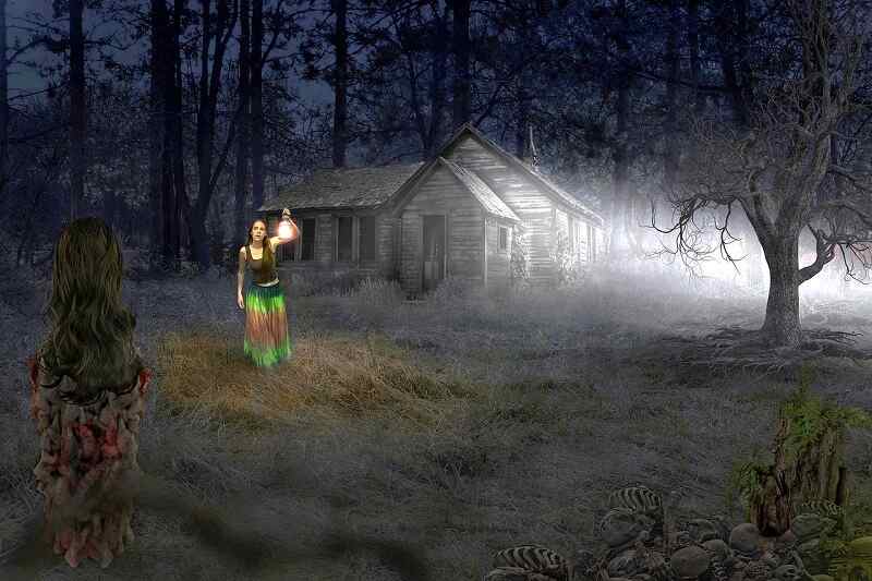 Haunted house with a woman holding a lantern in misty woods during Halloween night, and a ghost standing there.