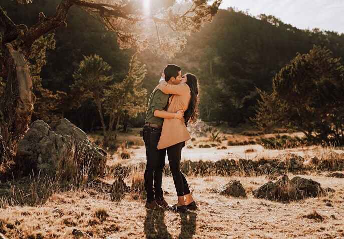 A couple sharing quality time in a forest